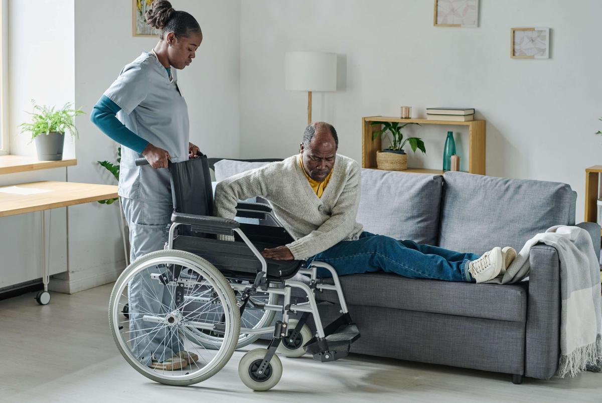 social-worker-caring-about-man-with-disability