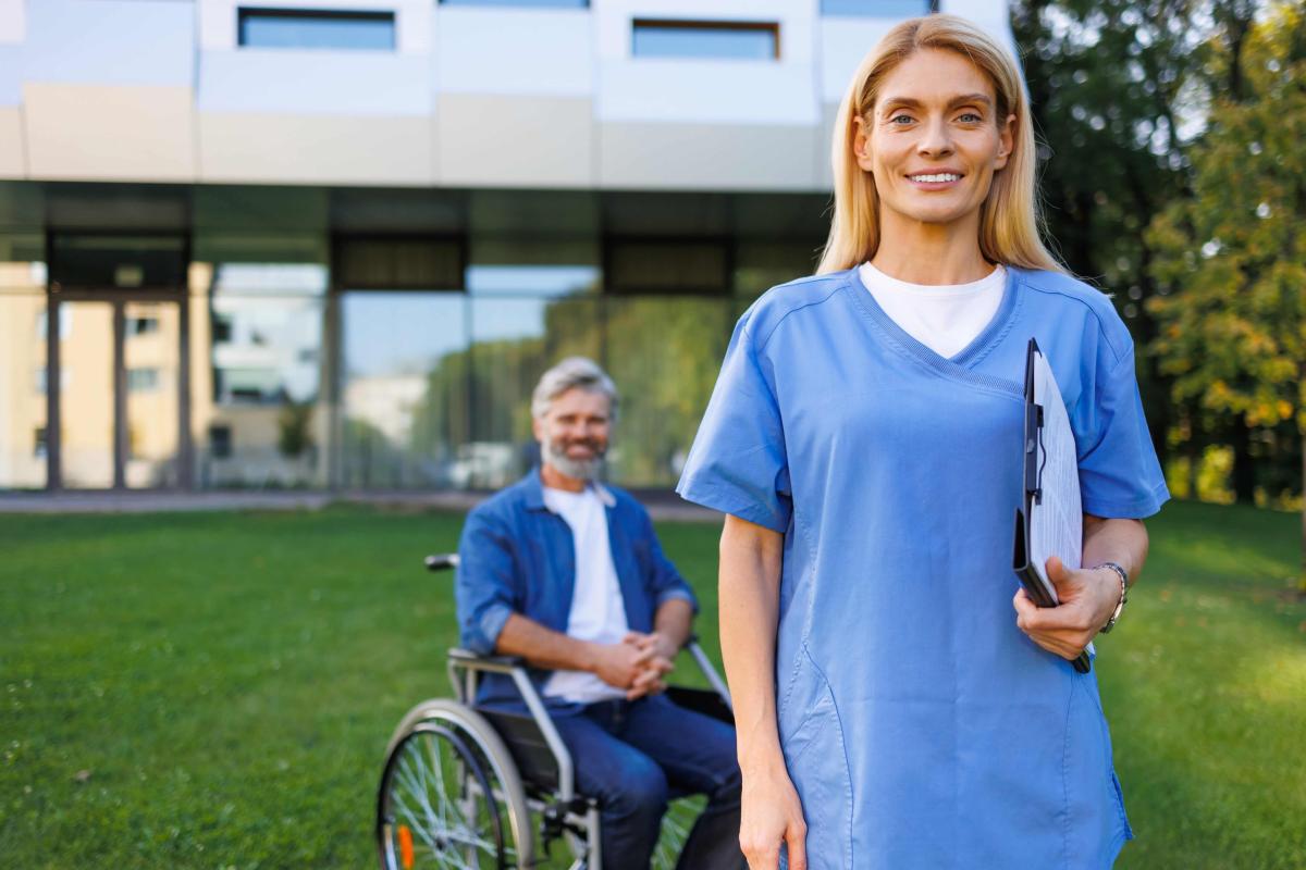 nurse-assists-patient-in-natur